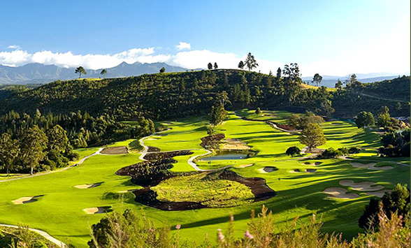 view from the elevated tee box of the fairways and hills of Simola Golf Course.