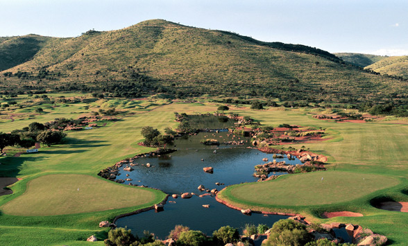 Fairways of the Lost City Golf Course with the Pilanesberg National Park beyond.