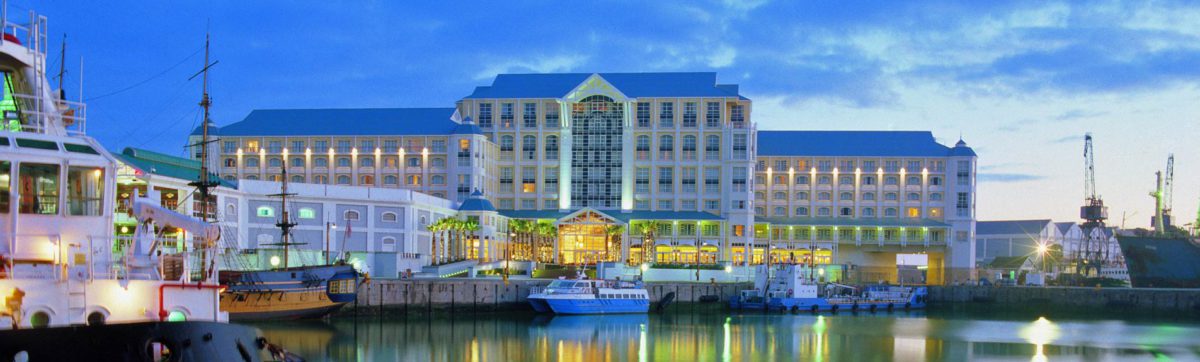 Reflections of the Table Bay Hotel in the water of the V&A Waterfront.