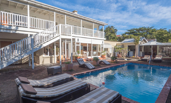 swimming pool and gardens at the Cuningham's Island Guest House.