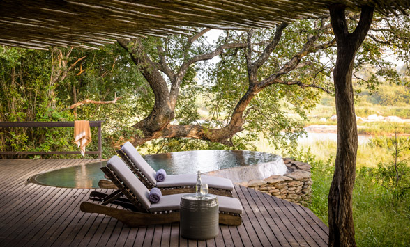 Private deck and Plunge pool at Singita Safari Lodge.