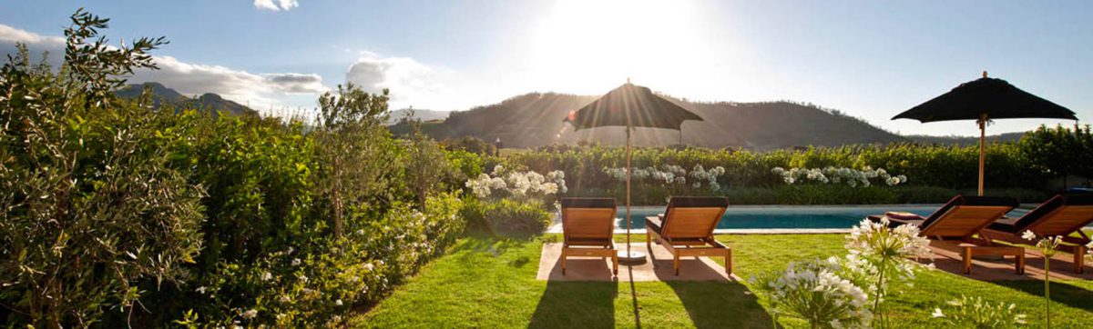 Sun loungers by the private pool at La Cle des Montagnes