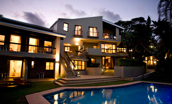 Sunset over the pool at Teremok Marine Boutique Hotel in South Africa.