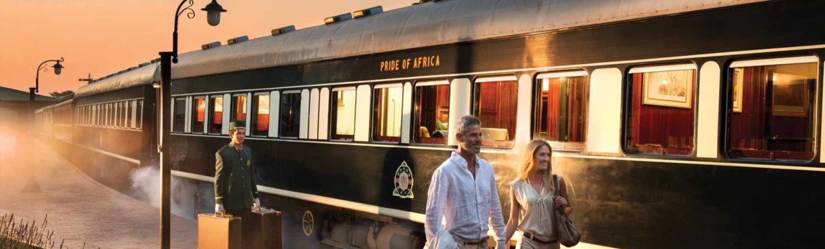 Couple boarding Rovos Rail steam train at the station in Pretoria