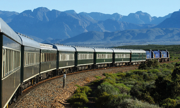 Rovos Rail train passing the Outeniqua Mountains.