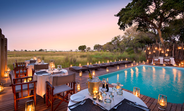 Candle light dining by the pool as the sun sets over the flood plains.