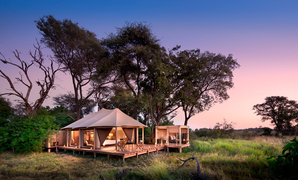 sun set in the Okavango above the tented suite at Nxabega.