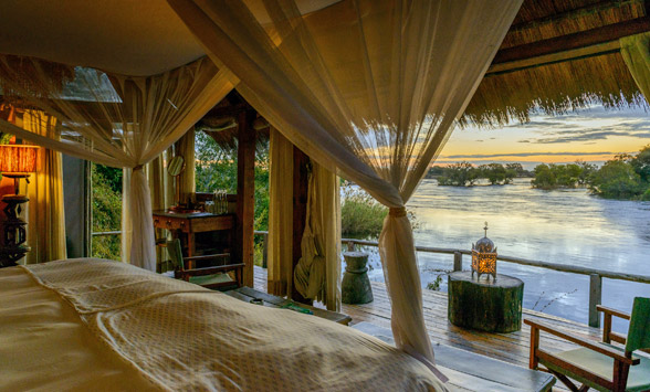 romantic setting at Tongabezi with views from the private deck of Victoria Falls.