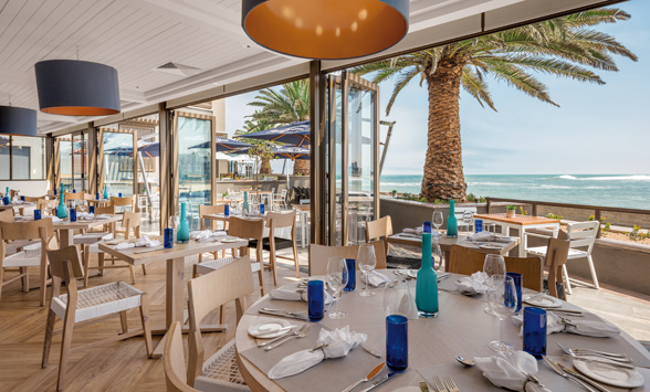 Elegant dining rooms with contemporary furnishings overlooking the Atlantic Ocean.