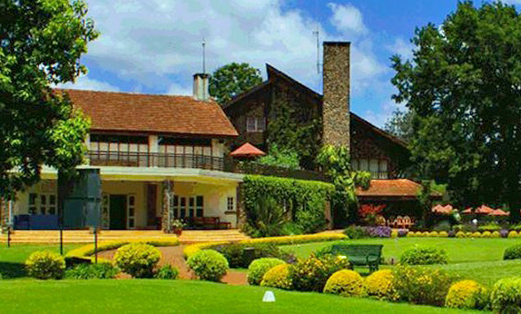 Exterior view of the clubhouse entrance at the Karen Country Club in Nairobi.